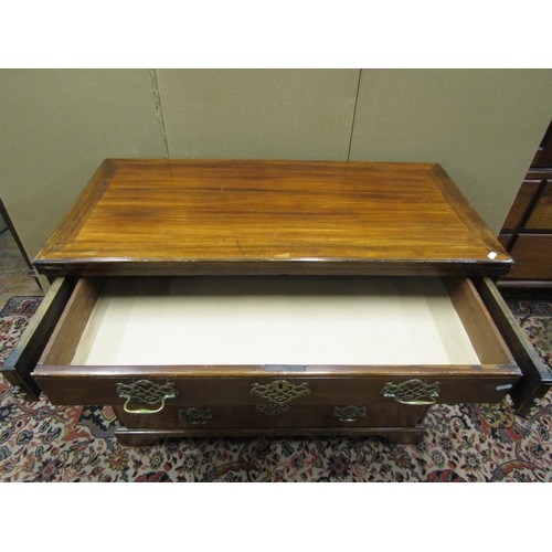 1396 - An antique mahogany chest of four drawers with bracket supports, set beneath a foldover top, 100cm w... 