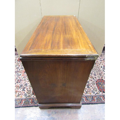 1396 - An antique mahogany chest of four drawers with bracket supports, set beneath a foldover top, 100cm w... 