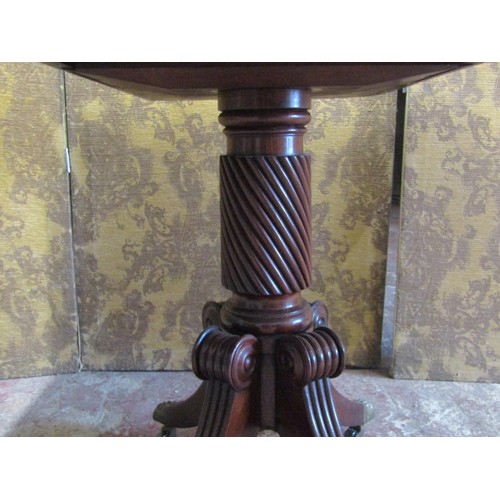 1371 - A Regency mahogany D end tea table the swivel top raised on a cylindrical spiral column stem and fou... 