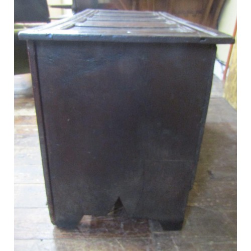 1416 - Early 18th century oak panelled coffer with carved and moulded frieze work, 240 cm wide