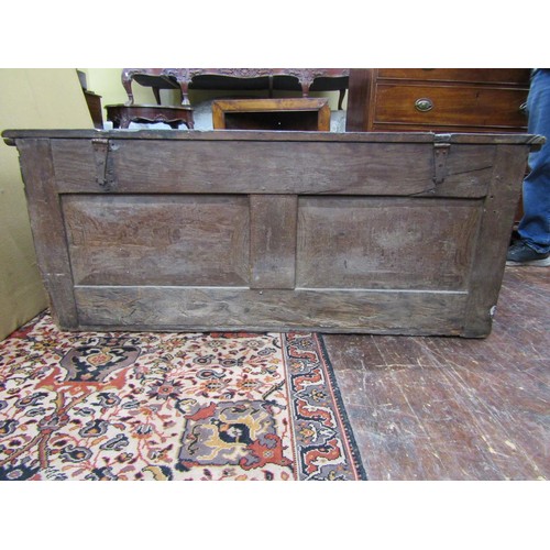 1418 - A 17th century and later oak coffer, with geometric repeating carved detail and ironwork handles, 55... 