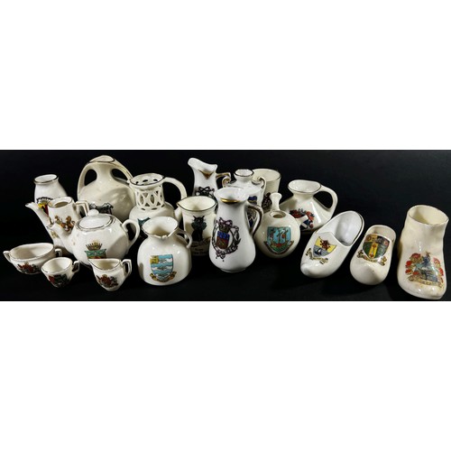 44 - A collection of crested china including a number of military pieces, principally archaeological find... 