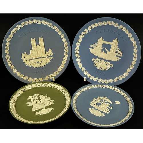 46 - An extensive collection of mainly blue Wedgewood jasperware to include commemorative plates / dishes... 