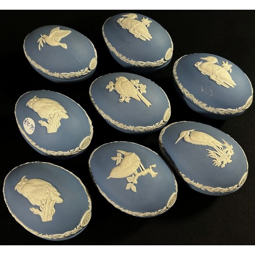 46 - An extensive collection of mainly blue Wedgewood jasperware to include commemorative plates / dishes... 