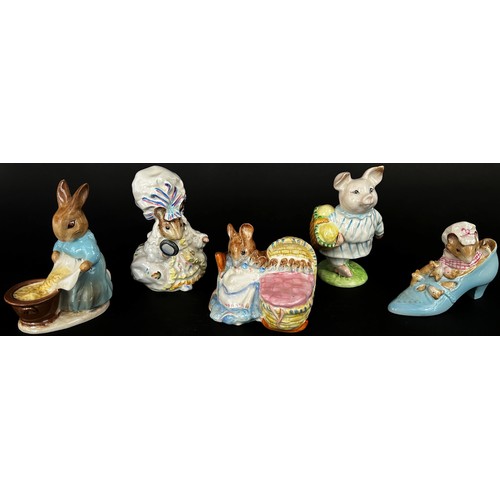 74 - A group of Beatrix Potter books plus five Beatrix potter porcelain figures group