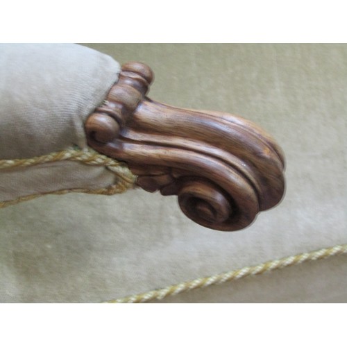 1449 - A small Victorian rosewood daybed with buttoned back and carved supports and scrolled arms