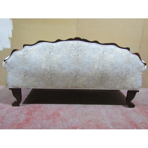 1448 - A Regency drawing room sofa with showwood frame depicting shells, scrolls and other detail, raised o... 