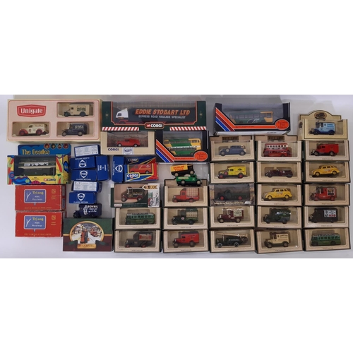 878 - A collection of boxed model vehicles including an Eddie Stobart lorry by Corgi 59504, vintage coach ... 