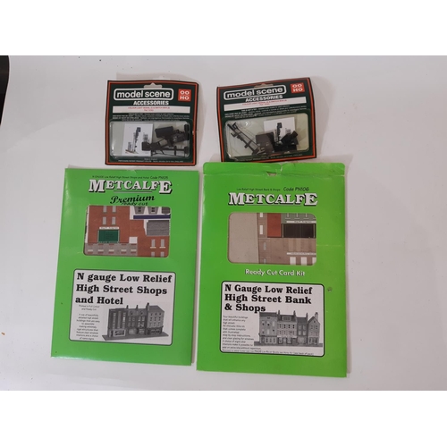 888 - A large collection of 00 gauge railway modellers workshop materials including, diesel train parts, l... 