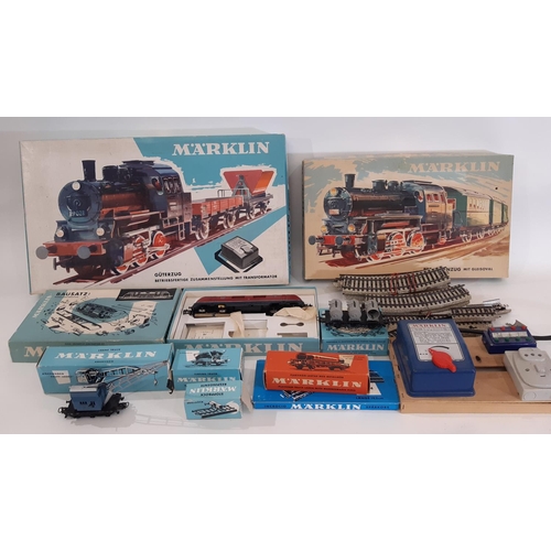 894 - A collection of HO gauge Marklin train sets and models including boxed sets 2967 and 3100, boxed rol... 