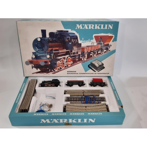 894 - A collection of HO gauge Marklin train sets and models including boxed sets 2967 and 3100, boxed rol... 