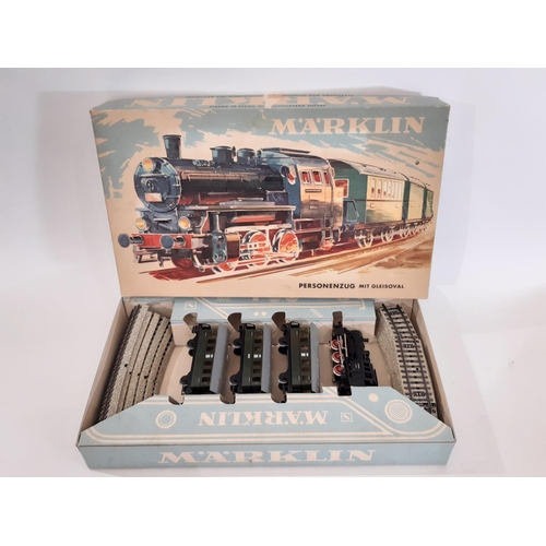 894 - A collection of HO gauge Marklin train sets and models including boxed sets 2967 and 3100, boxed rol... 