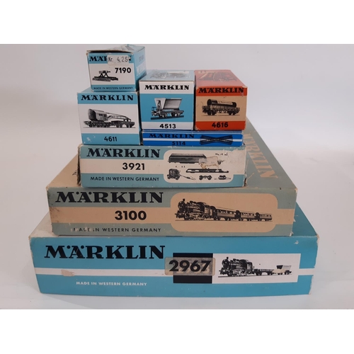 894 - A collection of HO gauge Marklin train sets and models including boxed sets 2967 and 3100, boxed rol... 