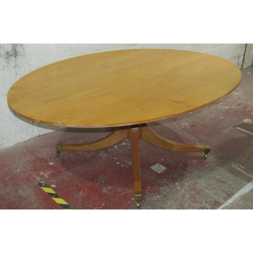 1461 - A good quality contemporary but Regency style chestnut and oak breakfast table of oval form by Marti... 