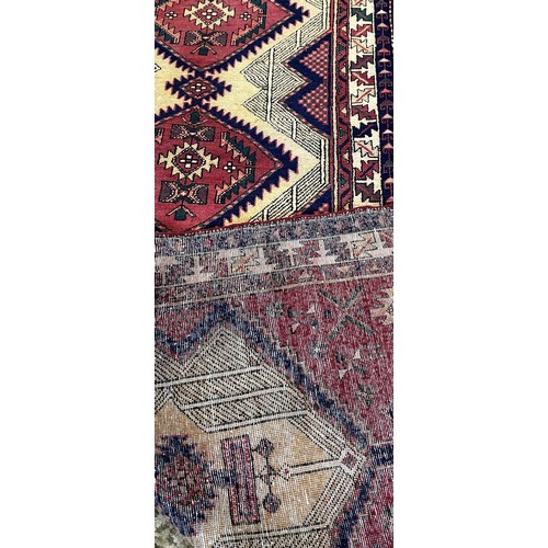 1492 - North West Persian Heriz Runner, with a row of three pink medallions with zig-zag surrounds, 307cm x... 