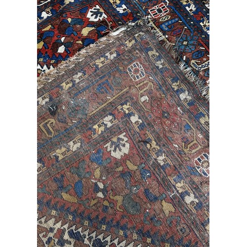 1482 - An old tribal Qashgai Persian rug with a central medallion with stylised flowers , 190 x 156cm appro... 