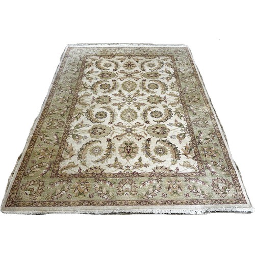 1485 - A Zeigler design carpet with an all over floral and frond pattern on a cream ground, 250cm x 170cm a... 