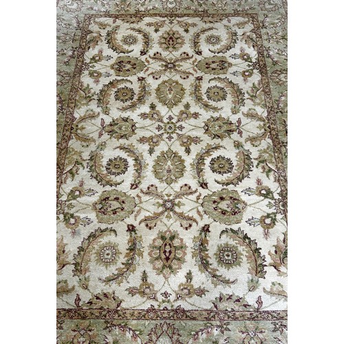 1485 - A Zeigler design carpet with an all over floral and frond pattern on a cream ground, 250cm x 170cm a... 