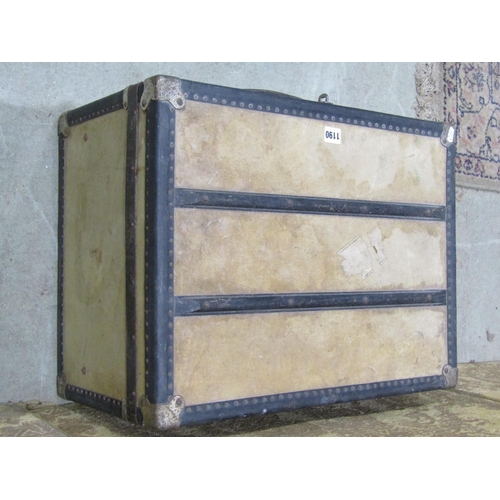 1190 - A small vintage travelling trunk with vellum panels by Debenham & Freebody, 56cm wide