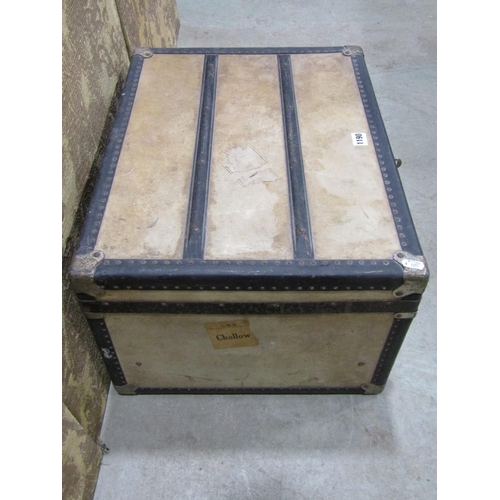 1190 - A small vintage travelling trunk with vellum panels by Debenham & Freebody, 56cm wide