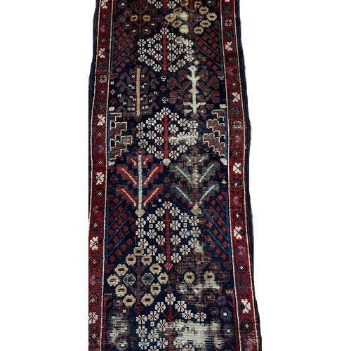 1488 - Two pieces of old North West Persian Runners, with an all over stylised floral pattern on a blue gro... 