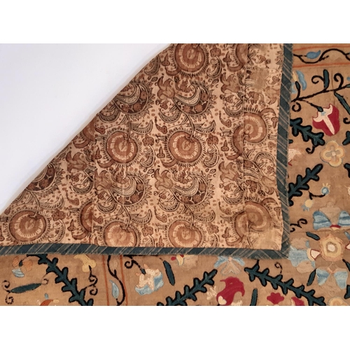 903 - 19th century Uzbek Suzani panel created from 4 sections embroidered in silk chain stitch on dark och... 