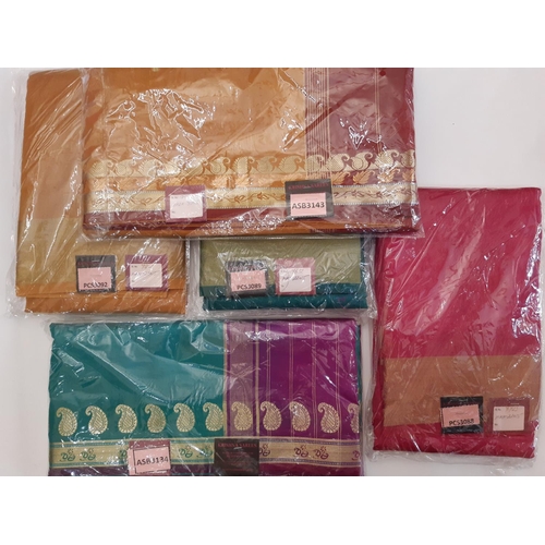 907 - 5 Indian saris by Krishna Sarees, unused in original packaging, together with 5 colourful silk saris... 