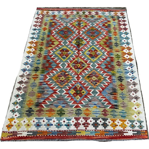 1500 - A Chobi kilim with a panel of alternating stepped diamonds, 150 x 103cm approximately