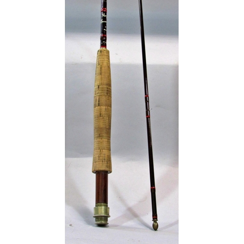 576 - A Hardy Bros Sovereign two peice graphite fishing rod, 9ft long, with a purple cotton cover and hard... 