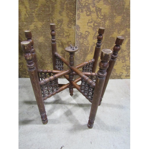 1083 - An old English oak drop leaf occasional table together with an Indian brass tray top table with fold... 