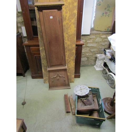 1264 - An Edwardian library bookcase in walnut, the base enclosed by a pair carved and panelled doors and t... 