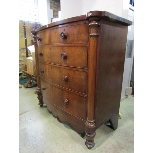 1270 - A Victorian mahogany bow front chest of  three long and two short drawers with column supports, 128c... 