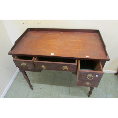 1438 - A mid Victorian mahogany kneehole dressing table fitted with an arrangement of four drawers raised o... 