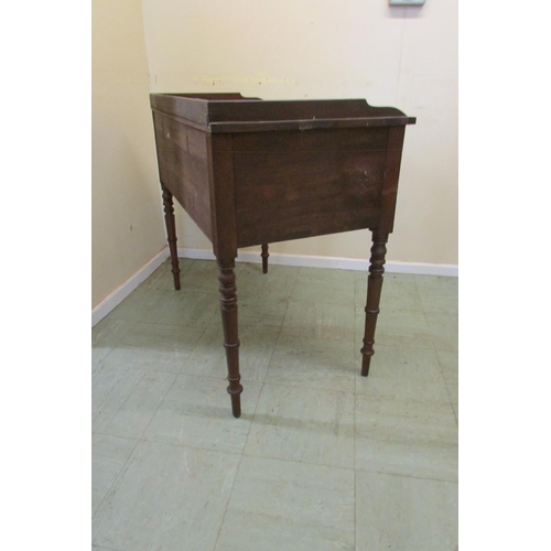 1438 - A mid Victorian mahogany kneehole dressing table fitted with an arrangement of four drawers raised o... 