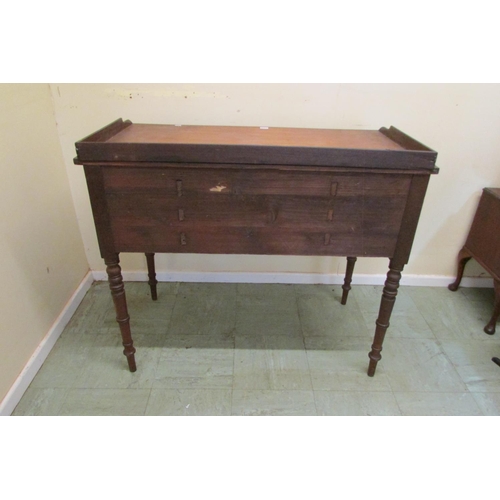 1438 - A mid Victorian mahogany kneehole dressing table fitted with an arrangement of four drawers raised o... 