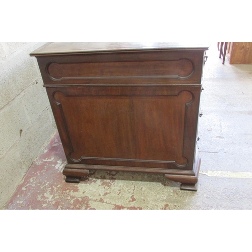 1440 - An Edwardian mahogany pedestal writing desk with inset leather top, the shaped outline incorporating... 