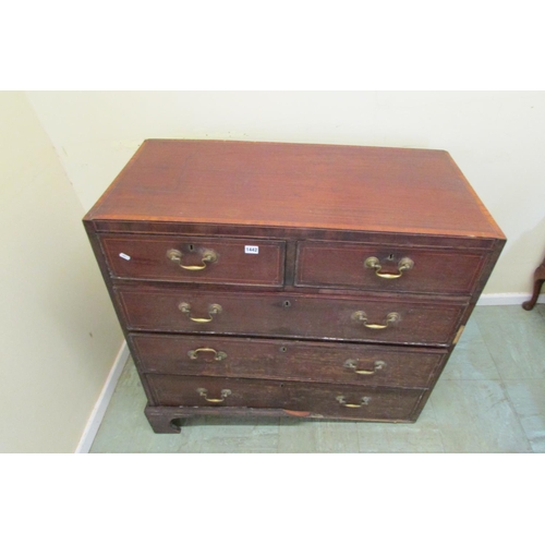 1442 - A Georgian mahogany chest of three long and two short drawers crossbanded in satin wood and with fur... 