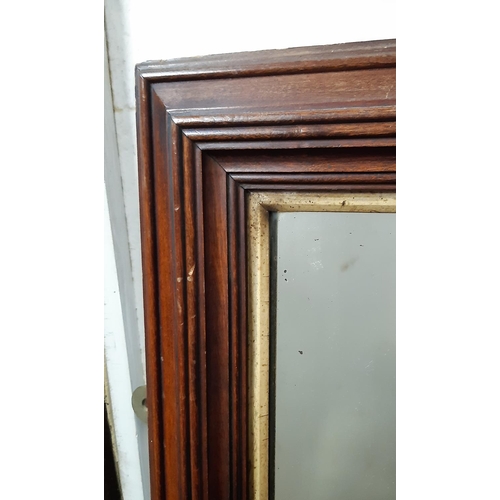 1289 - A simple 19th century wall mirror with stepped and moulded frame, 92cm x 65cm