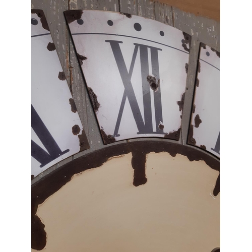 1295 - A large decorative contemporary clock dial on distressed oak panel, 120cm square