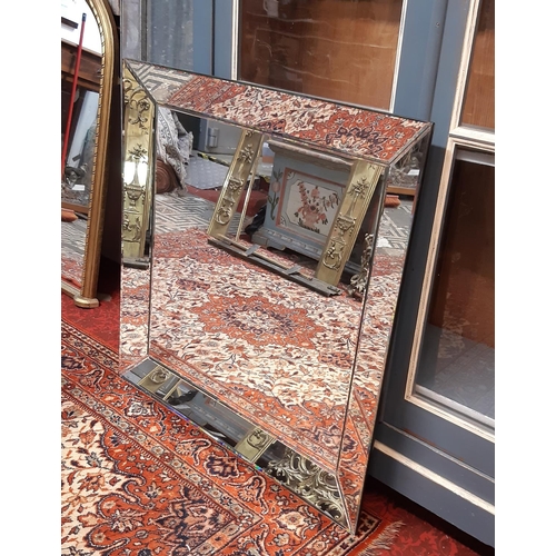 1300 - A contemporary art deco style wall mirror within a mirrored frame, 93cm x 93cm