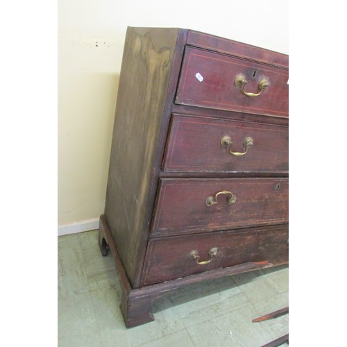 1442 - A Georgian mahogany chest of three long and two short drawers crossbanded in satin wood and with fur... 