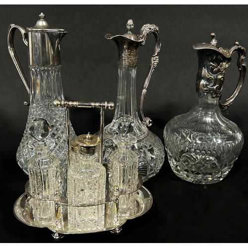 131 - A miscellaneous collection of silver plate and glass ware, including an Art Nouveau water jug, two p... 