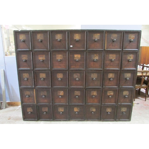 1447 - A very large 19th century oak run of 35 drawers, oak lined, each drawer 30 cm height x 27 cm wide x ... 