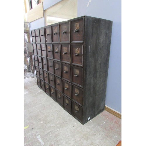 1447 - A very large 19th century oak run of 35 drawers, oak lined, each drawer 30 cm height x 27 cm wide x ... 