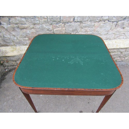 1421 - A Regency mahogany D end foldover top card table with string inlay detail on square tapered legs, 91... 