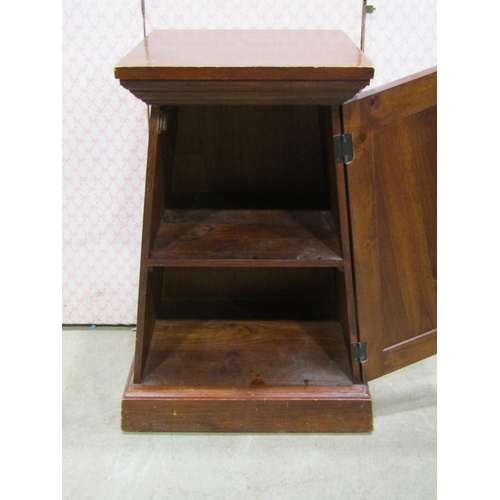 1211 - A square cut and tapering cupboard enclosed by a panelled door, together with a further oak locker