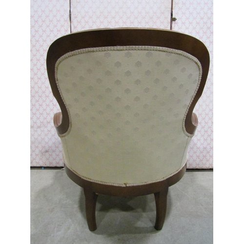 1230 - A Victorian style drawing room chair with upholstered finish