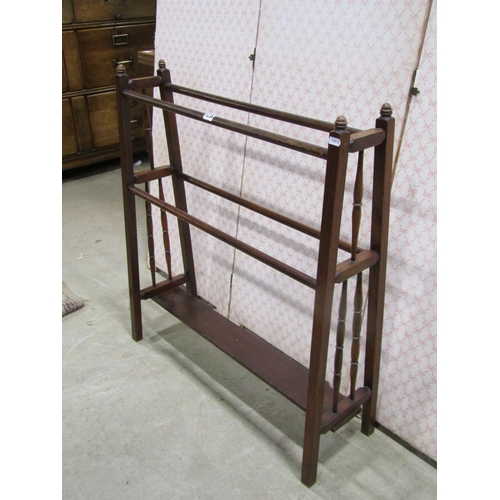 1236 - An Edwardian walnut clothes horse of tapering form