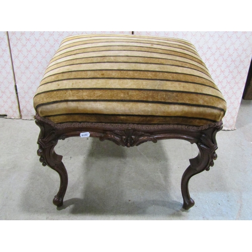 1237 - A 19th century centre stool raised on four cabriole supports with carved detail, and one other