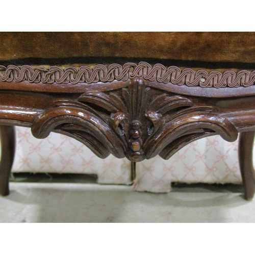 1237 - A 19th century centre stool raised on four cabriole supports with carved detail, and one other